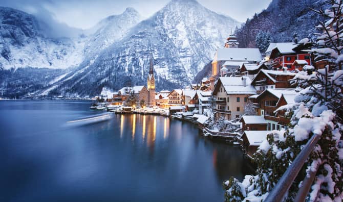 A snowy town by a lake