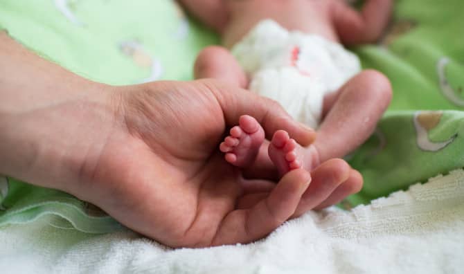 Why This Grandpa Spent the Last 12 Years Cuddling Babies