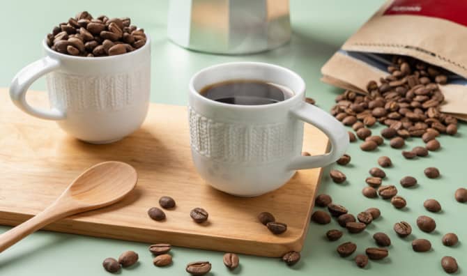 Espresso coffee and coffee beans.