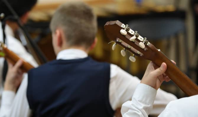 A  50-Kid Rock Orchestra