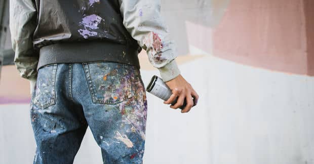 Artist Turns Hateful Graffiti Into Beautiful Designs