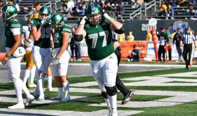 College Student Gives His Full Football Scholarship to Friend