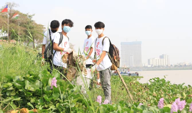 Volunteers Clean and Restock Rivers in Cambodia