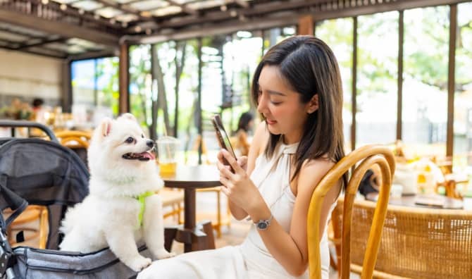 Pet parent posting a picture of having lunch with her baby.