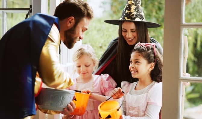 Trick-or-treating on Halloween.