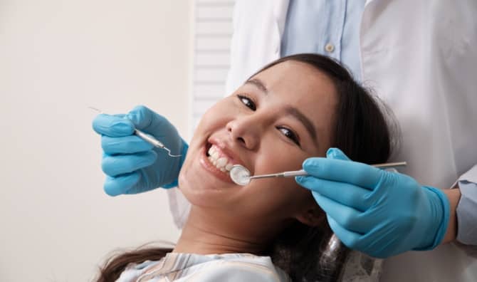 A woman at a dental appointment.