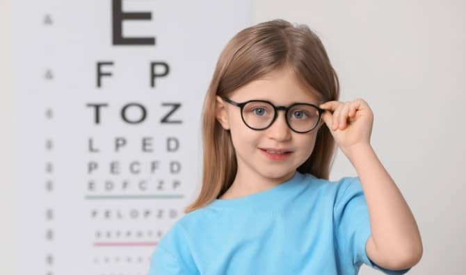 Girl getting her first pair of glasses.