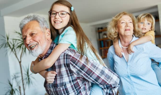 Grandparents watching their grandchildren.