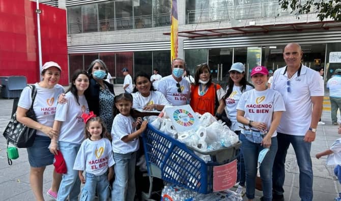 Volunteers gather with supplies during a Good Deeds Day community activity in Mexico.