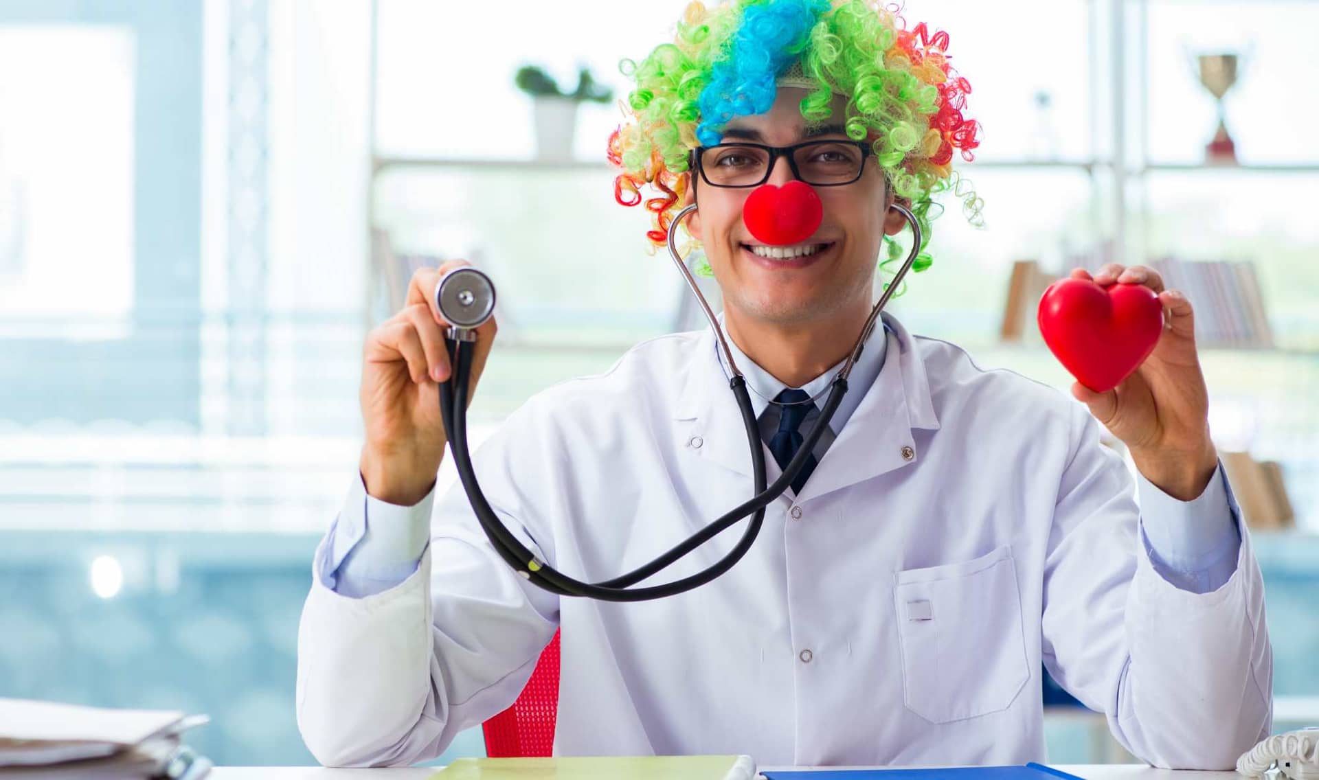 Dr. dresses as a clown.
