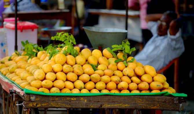 Orange Vendor Becomes an Educational Icon