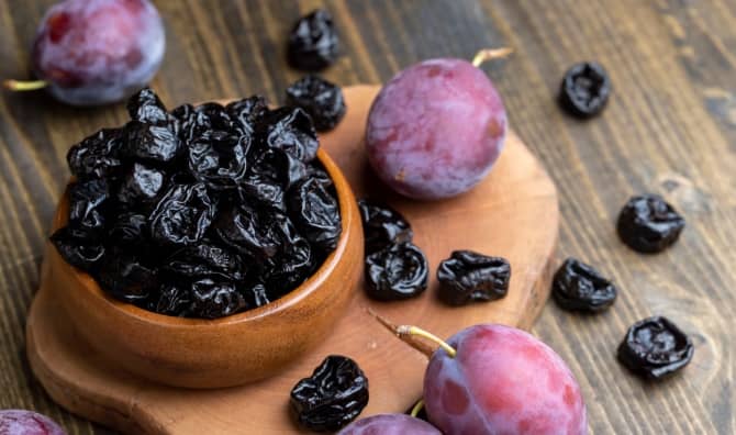Purple plums can be dried into prunes.