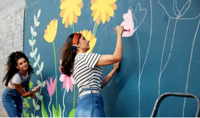 Painting a mural at a school.