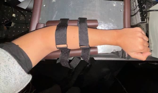 A doctor checks a patient’s blood sugar level.