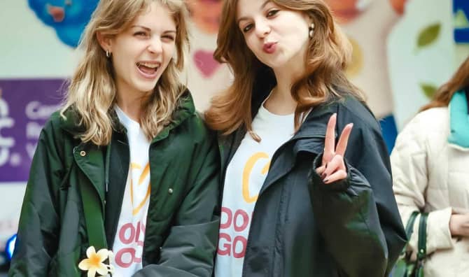 Two young volunteers at the RVC Center in Moldova.