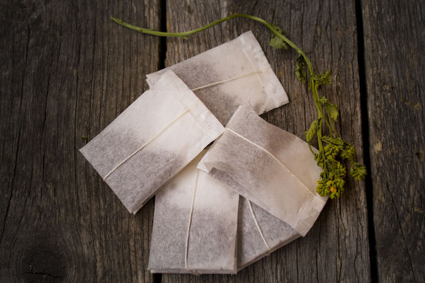 Teabags on a wood piles