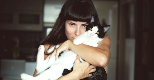 Woman holding a cat