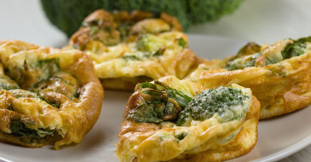 Puff pastry squares with spinach cheese filling.