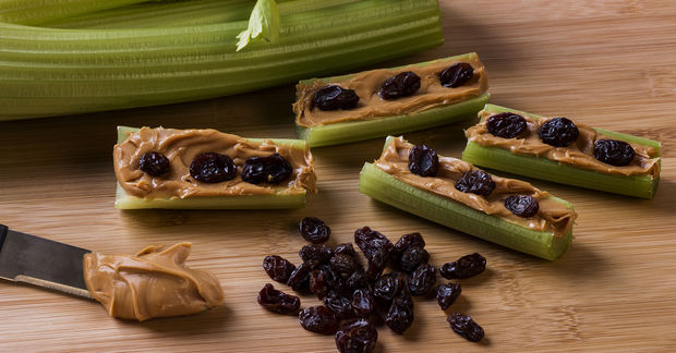 Celery sticks with peanut butter and raisins.