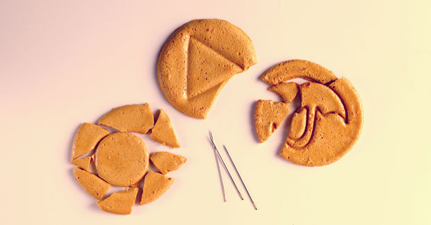 Korean popgi candy, honeycomb toffee sugar candy with umbrella and triangle shapes.