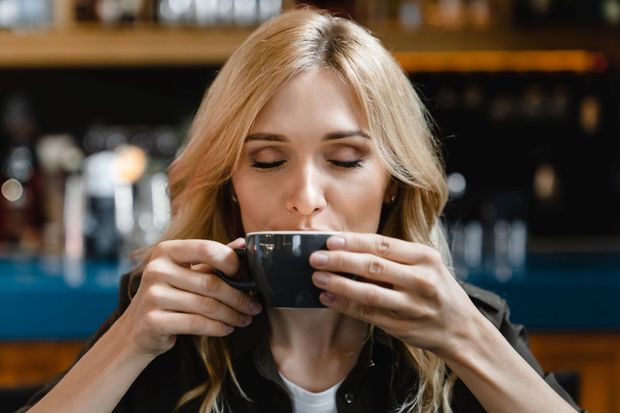 Woman drinking coffee